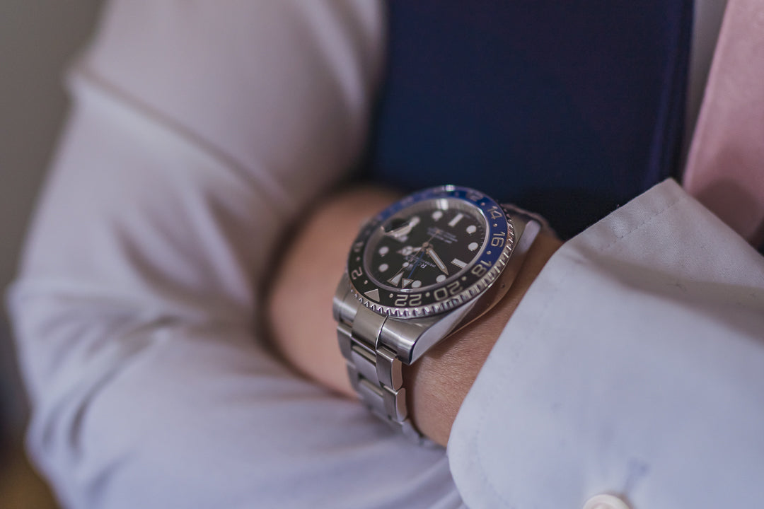 A luxury GMT watch on the wrist